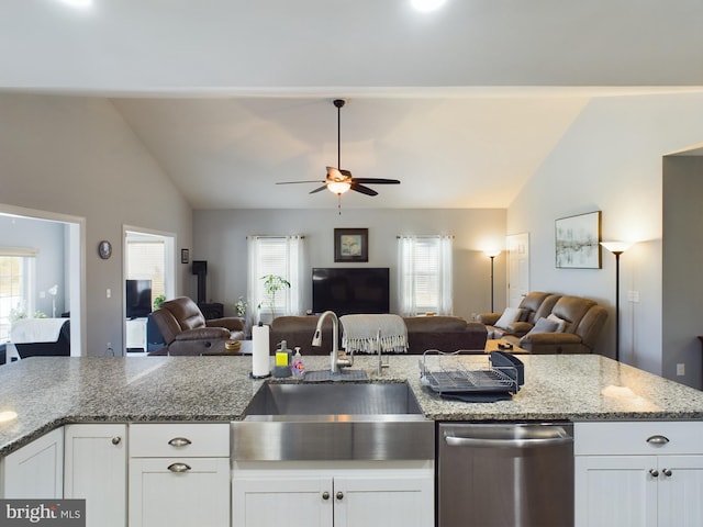 kitchen with dishwasher, white cabinetry, and plenty of natural light