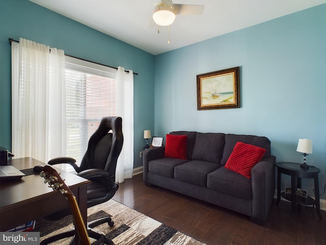 office area featuring dark hardwood / wood-style floors and ceiling fan