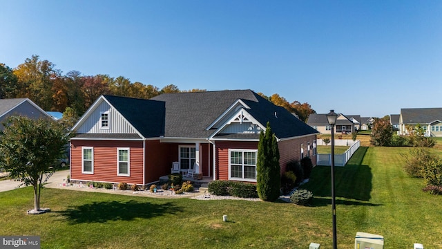 view of front of home featuring a front lawn