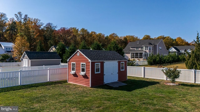 view of outdoor structure with a lawn