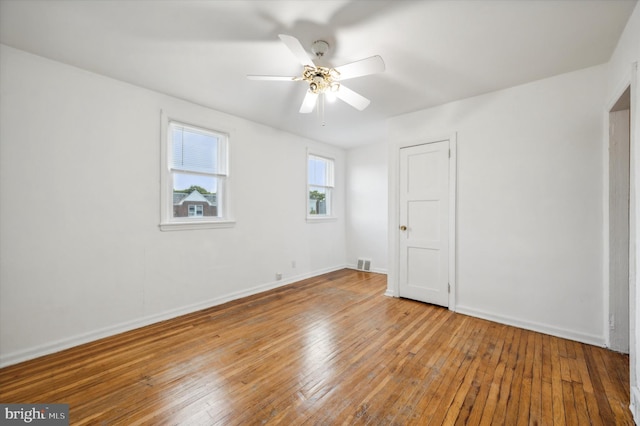 unfurnished room featuring wood-type flooring and ceiling fan