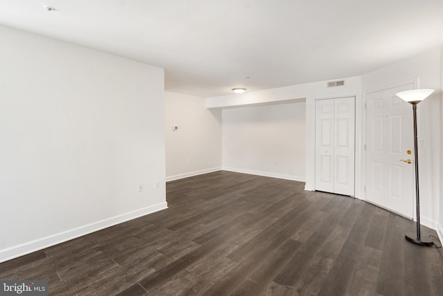 interior space featuring dark wood-type flooring