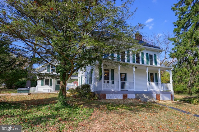 438 Green Spring Rd, York, PA 17403 - colonial house with a chimney and covered porch