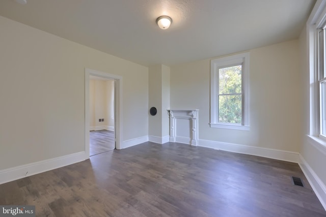 interior space with dark hardwood / wood-style flooring