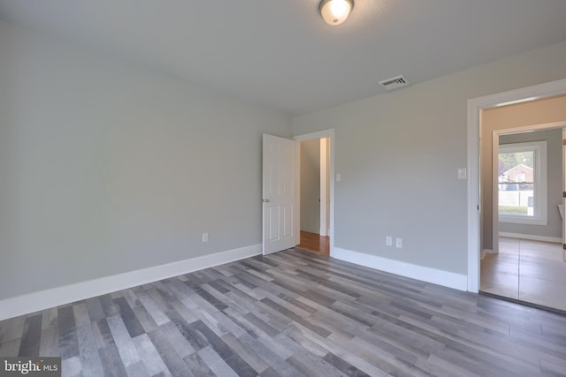 empty room featuring hardwood / wood-style floors