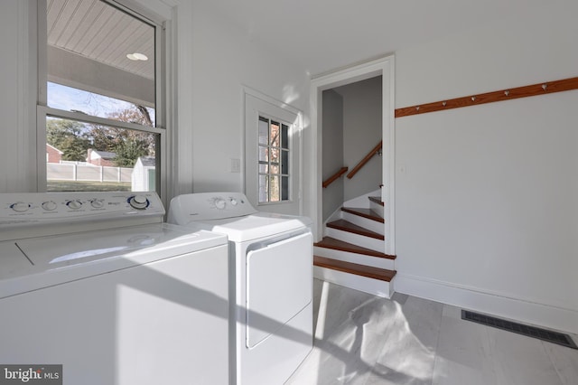 438 Green Spring Rd, York, PA 17403 - clothes washing area featuring marble finish floor, laundry area, independent washer and dryer, and visible vents