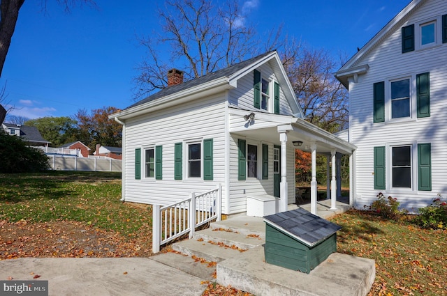438 Green Spring Rd, York, PA 17403 - view of front of home with a front lawn and a chimney