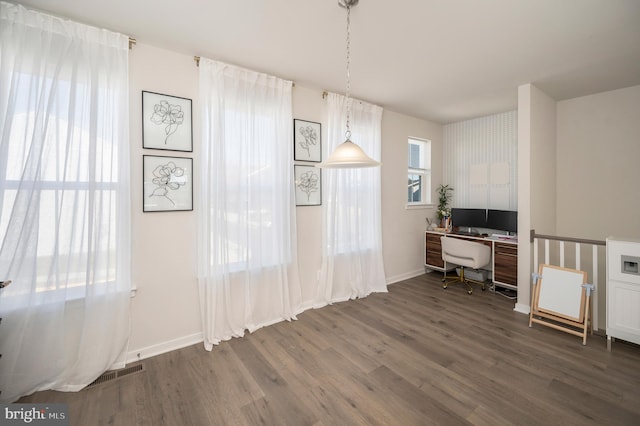 office space with dark hardwood / wood-style floors