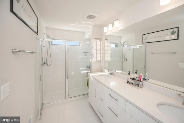 bathroom with vanity and walk in shower