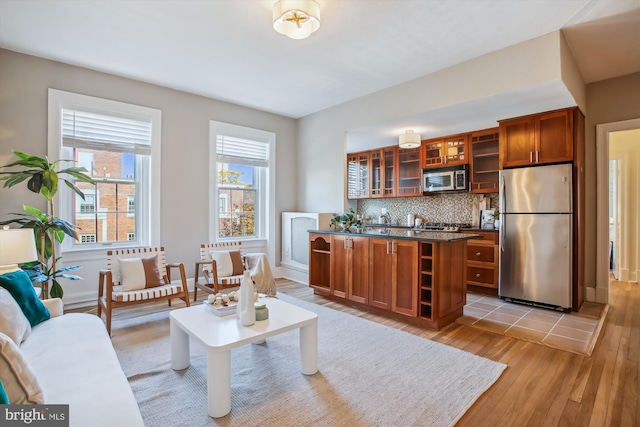 living room with light hardwood / wood-style flooring