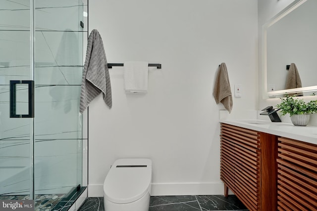 bathroom with vanity, toilet, and walk in shower