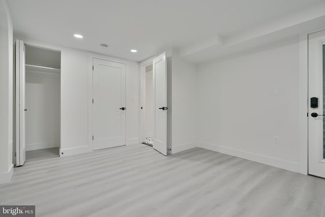 unfurnished bedroom featuring light hardwood / wood-style floors