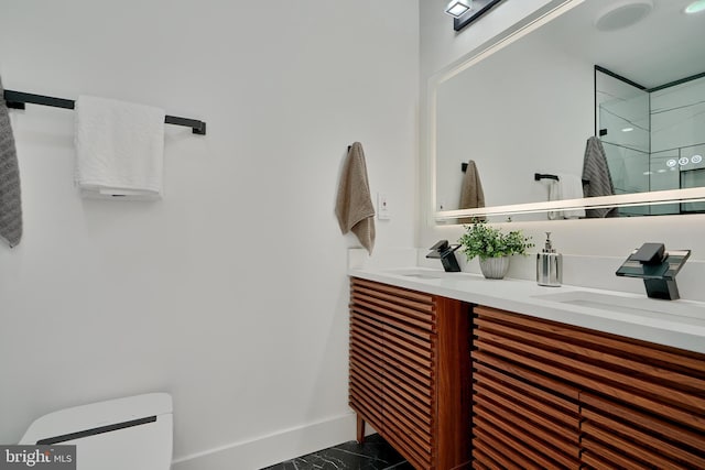 bathroom with toilet and vanity