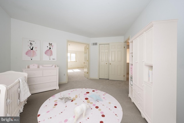 bedroom with carpet and a closet