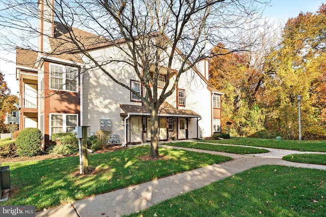 view of front of property with a front lawn