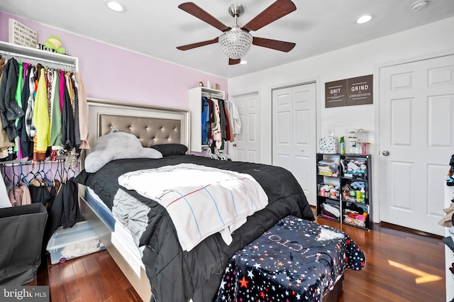 bedroom featuring dark wood-type flooring and ceiling fan