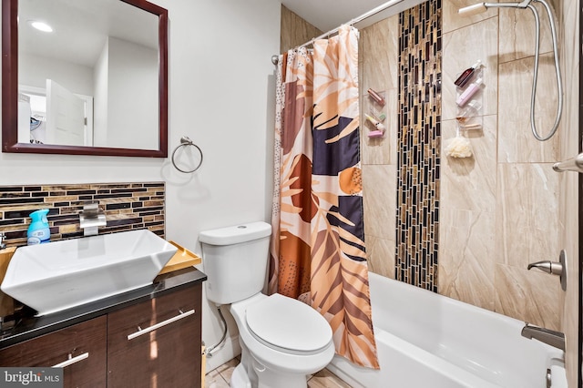 full bathroom featuring vanity, shower / bath combination with curtain, toilet, and tasteful backsplash