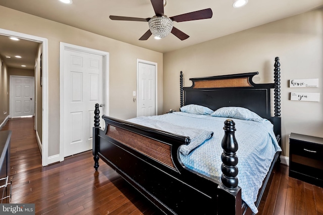 bedroom with ceiling fan and dark hardwood / wood-style flooring