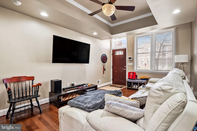 living room with crown molding, ceiling fan, and dark hardwood / wood-style flooring