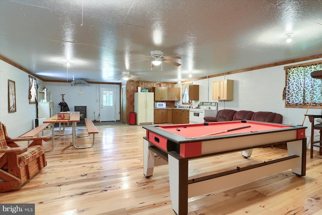 game room with billiards, a textured ceiling, light wood-type flooring, and ceiling fan