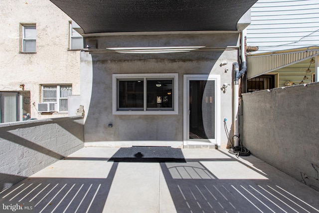 property entrance featuring cooling unit