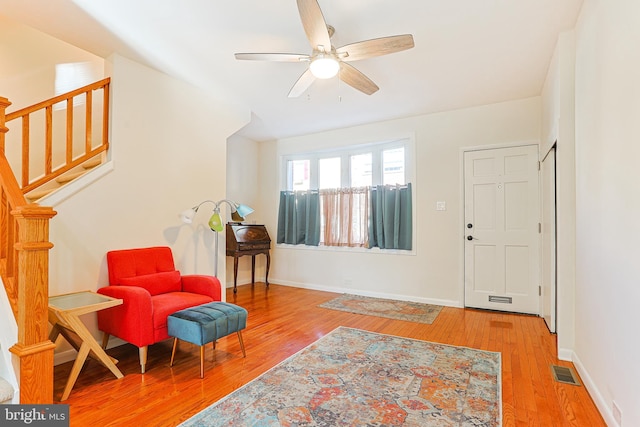 entrance foyer featuring light hardwood / wood-style floors and ceiling fan