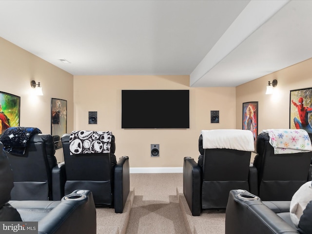 home theater with light carpet