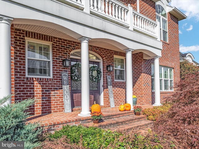 doorway to property with a balcony