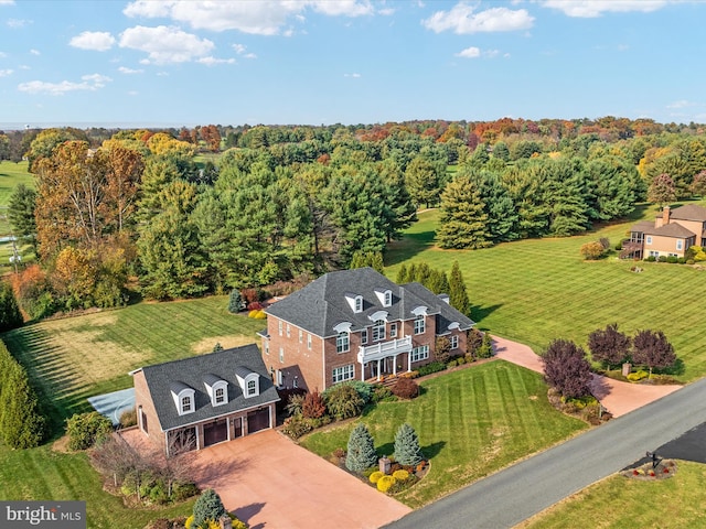 birds eye view of property featuring a rural view