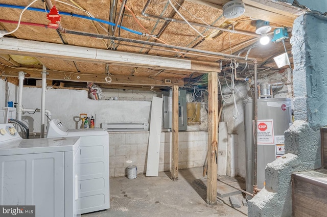 basement with washer and dryer, gas water heater, and electric panel