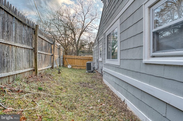 view of yard with central AC