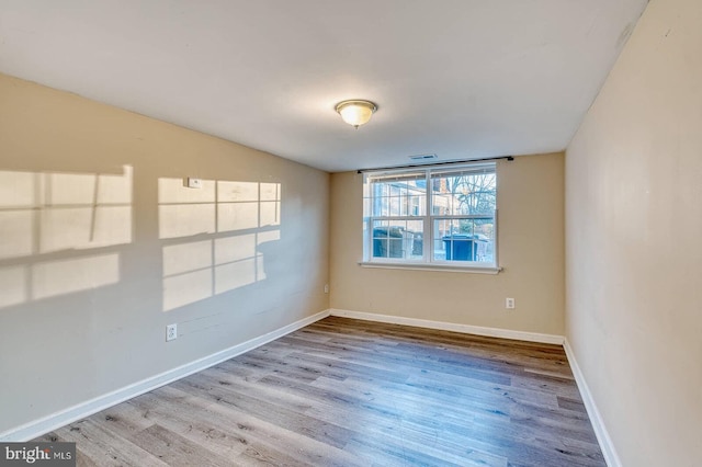 empty room featuring light hardwood / wood-style floors