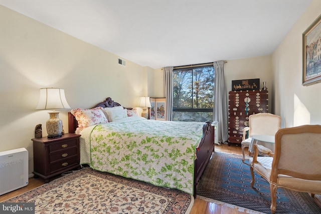 bedroom featuring hardwood / wood-style flooring