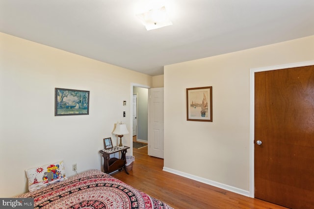 bedroom featuring hardwood / wood-style flooring