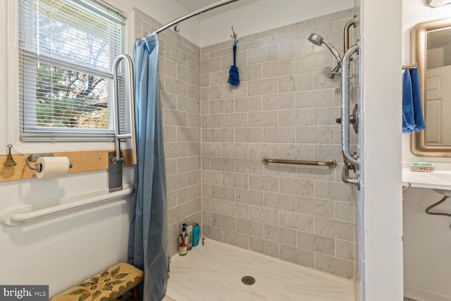 bathroom with a shower with curtain