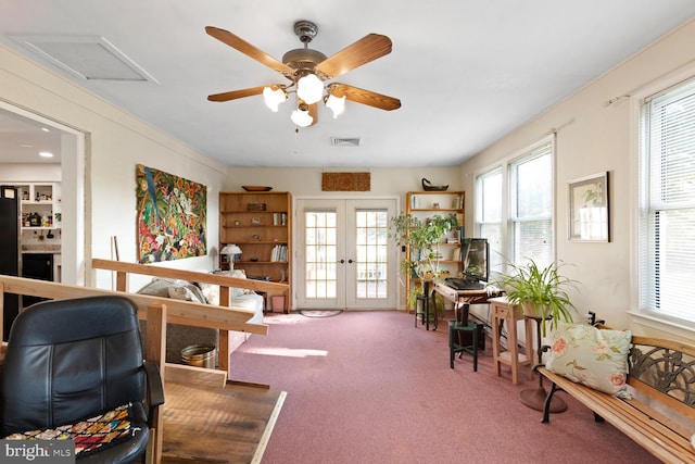 interior space featuring a wealth of natural light, french doors, carpet floors, and ceiling fan