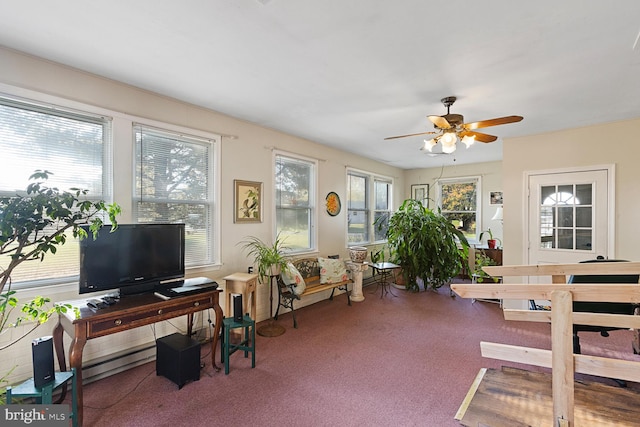 interior space with ceiling fan