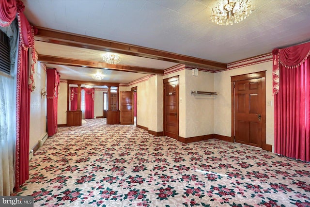 hall featuring a chandelier, beam ceiling, a baseboard heating unit, and baseboards