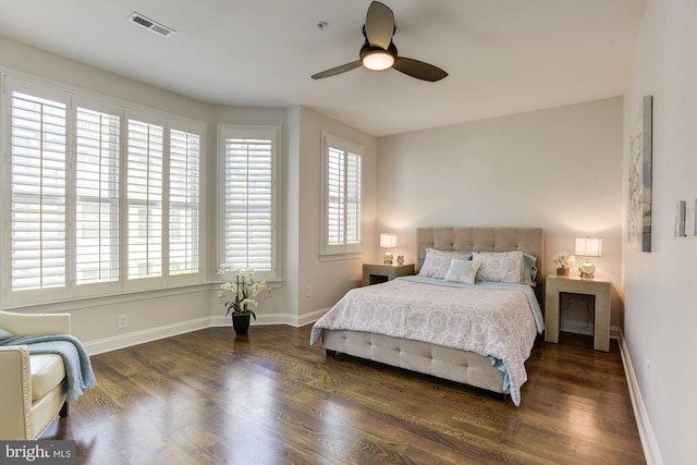 bedroom featuring dark wood-type flooring and ceiling fan