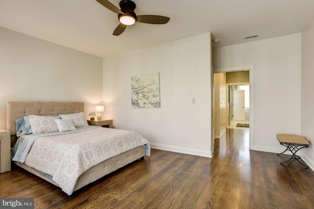 bedroom with dark wood-type flooring and ceiling fan