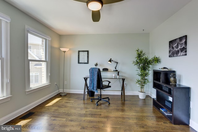 office area featuring dark wood-type flooring and ceiling fan