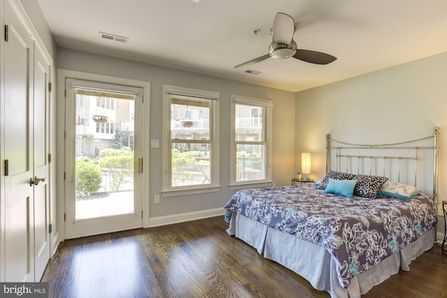 bedroom featuring ceiling fan, access to outside, and dark hardwood / wood-style flooring