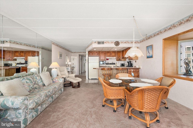 dining room with light colored carpet