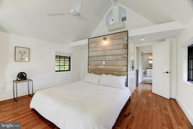 bedroom with high vaulted ceiling, a ceiling fan, baseboards, and wood finished floors