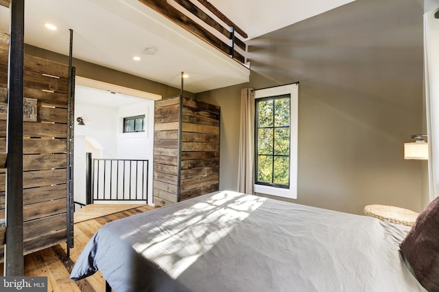 bedroom featuring light wood-style floors and recessed lighting