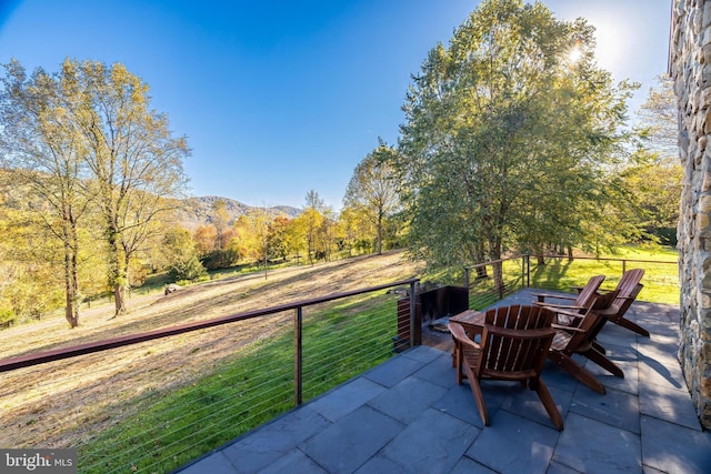 view of patio featuring a mountain view