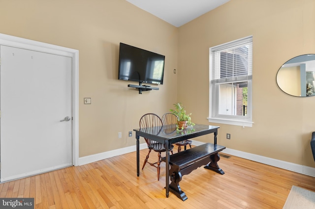 dining room with light hardwood / wood-style flooring