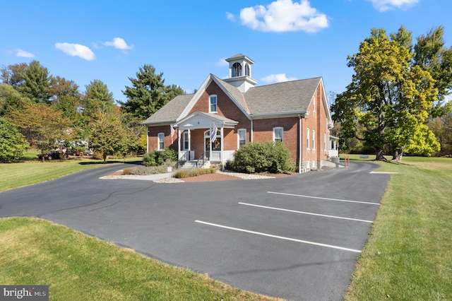 exterior space with a front yard