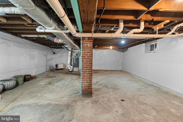 basement featuring heating unit