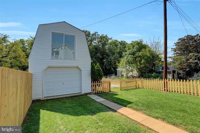 exterior space featuring an outbuilding and a lawn